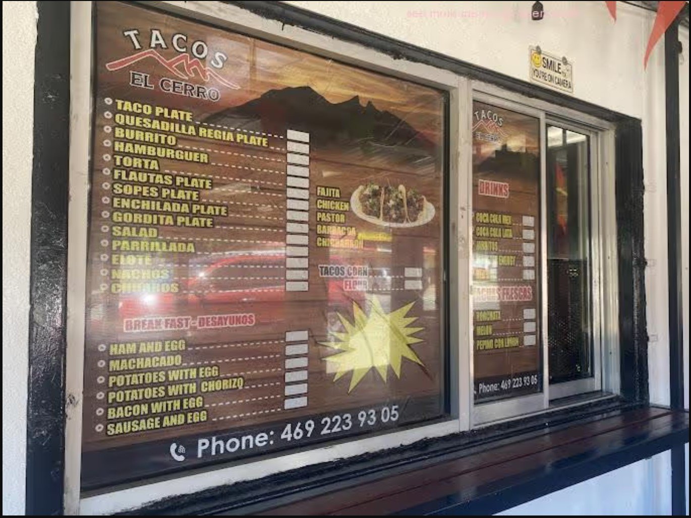 Tacos El Cerro menu board